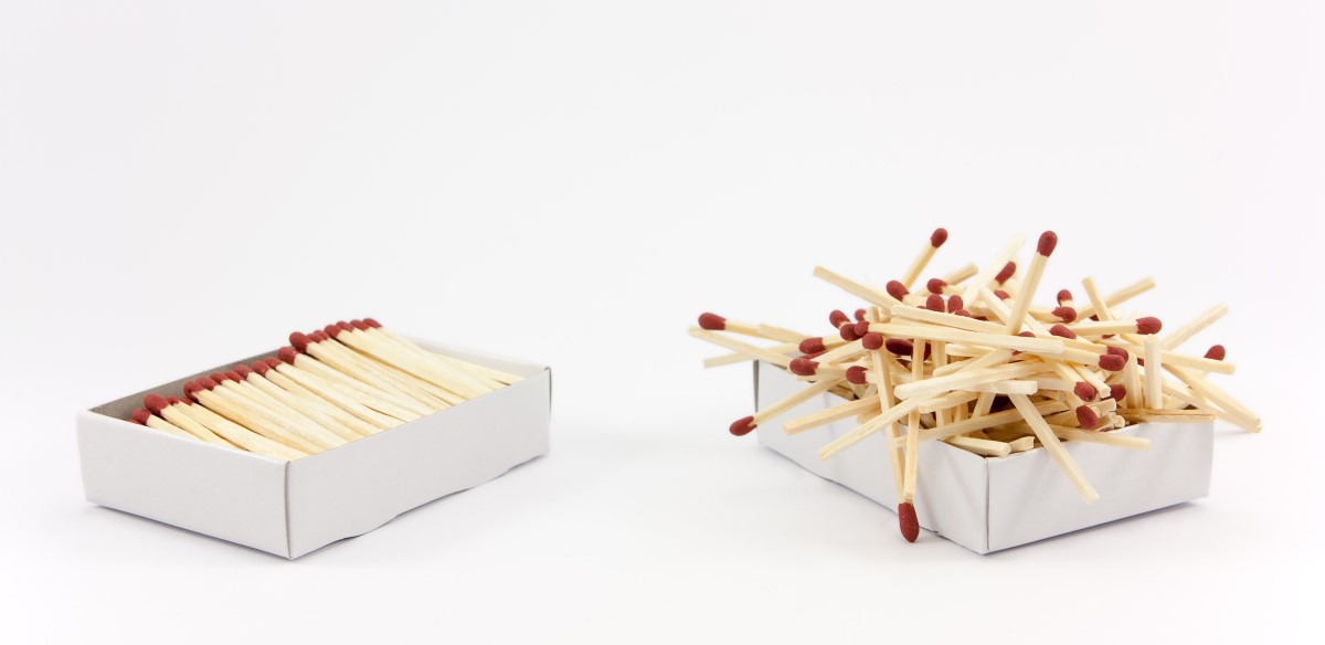 neat matchbox next to matchbox with messy thrown in matches. Nearshoring prevents cultural differences.